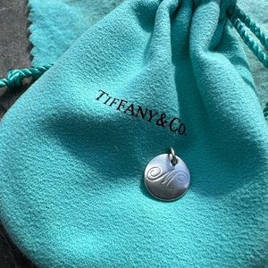 Tiffany & Co. circle M charm